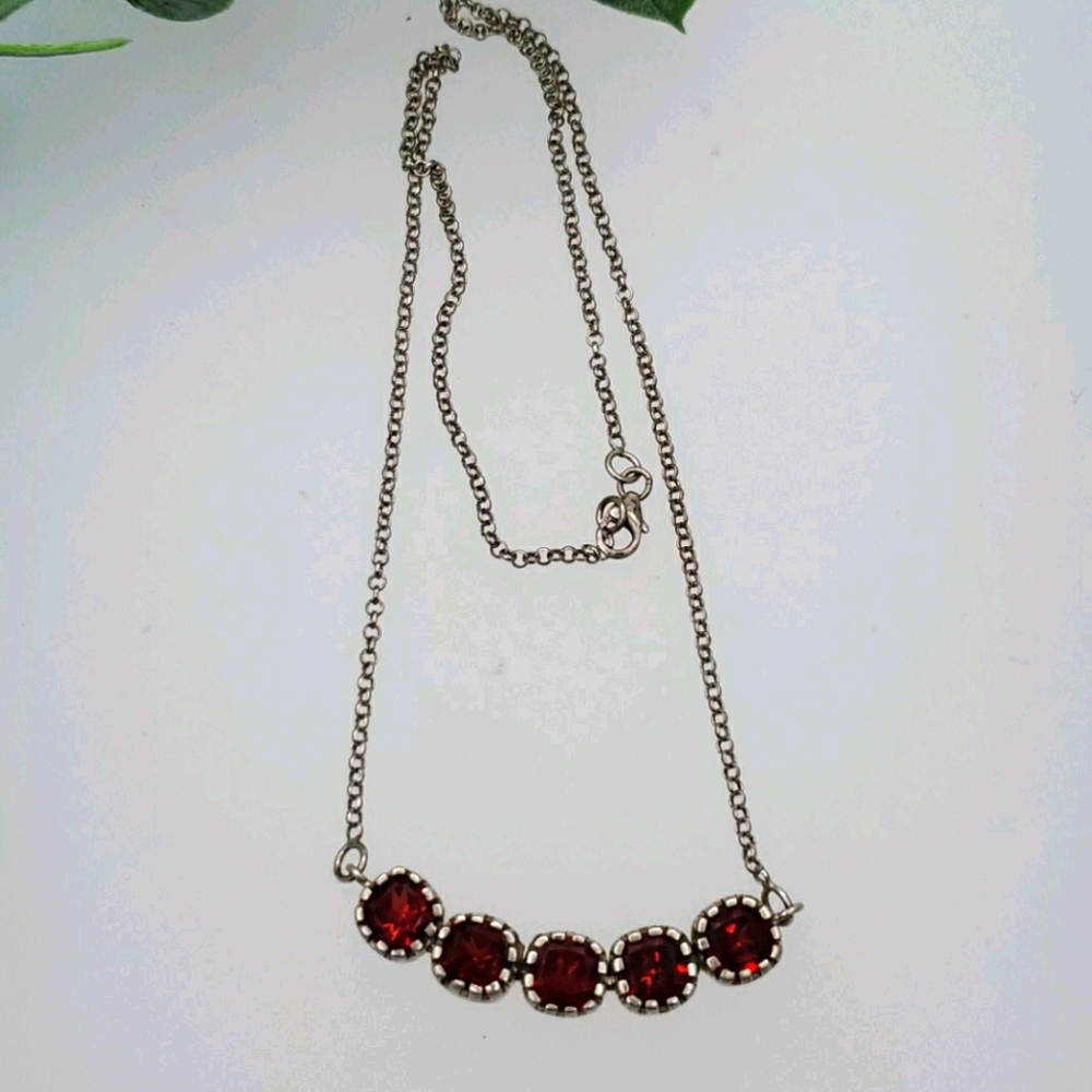 Sterling silver garnet necklace.